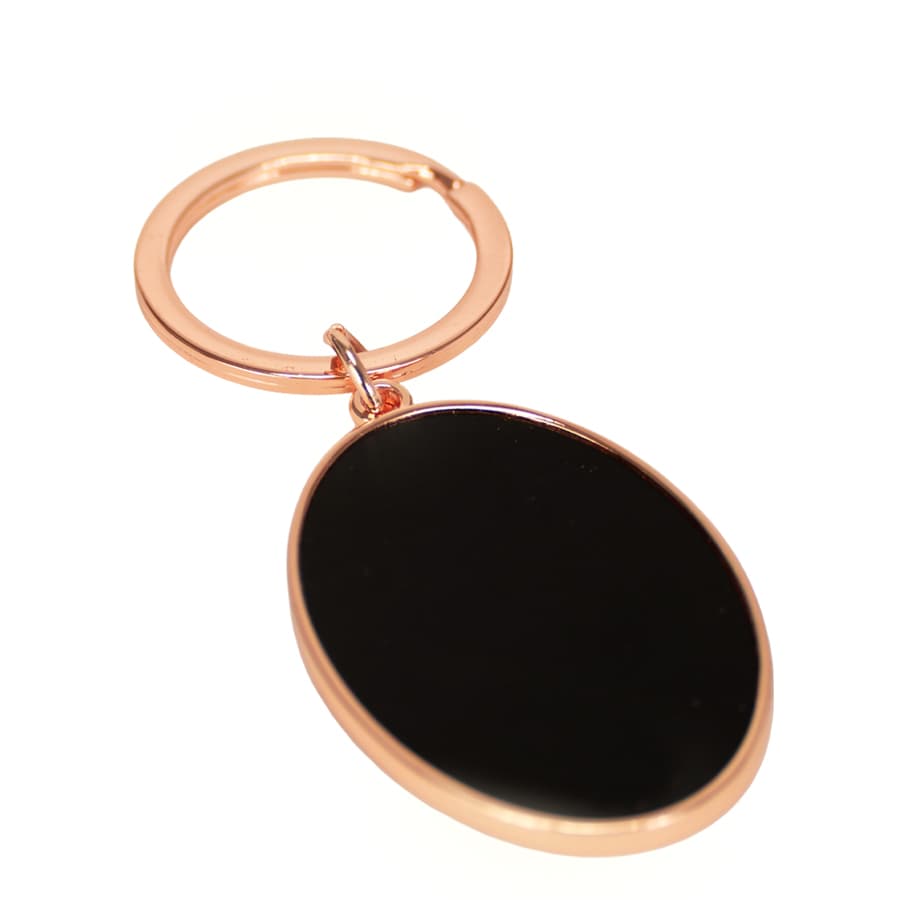 Llavero ovalado encobrizado negro «SAM»